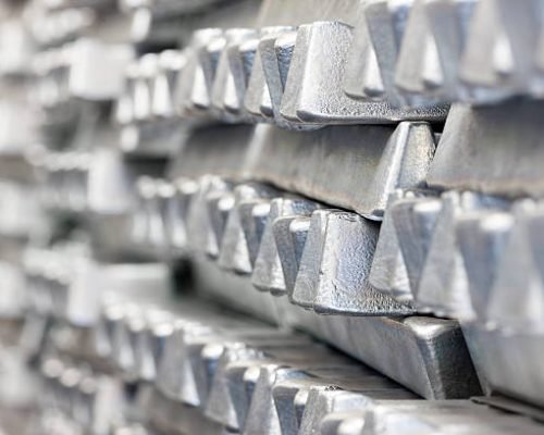 Stack of Aluminum ingots. Shallow depth of field.
